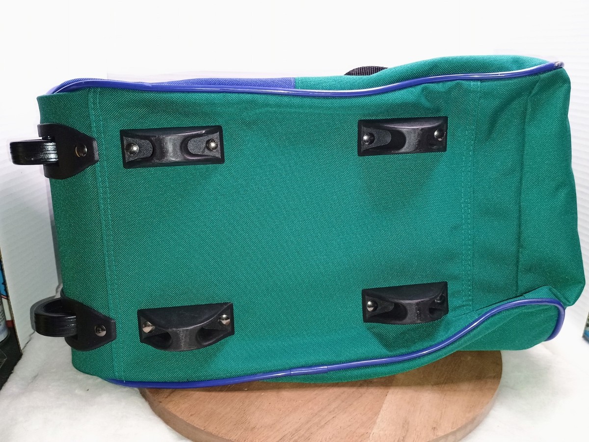 This vintage Cherokee brand duffel bag features a colorful three