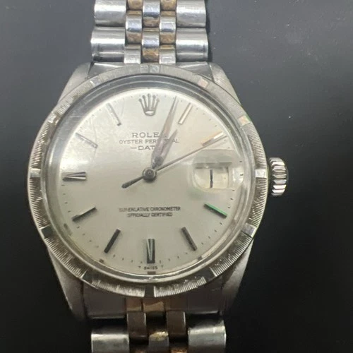 Vintage Rolex Oyster Perpetual Date wristwatch being sold for parts or repair
