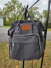keababies diaper bag backpack charcoal comes with a changing pad