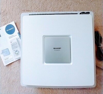 sharp plasmacluster ion air purifier FP-N25CX with remote control.