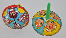 U.S. Metal Toy Mfg. Co. Tin Litho Noise Maker Four Face Clown Handle Bell
