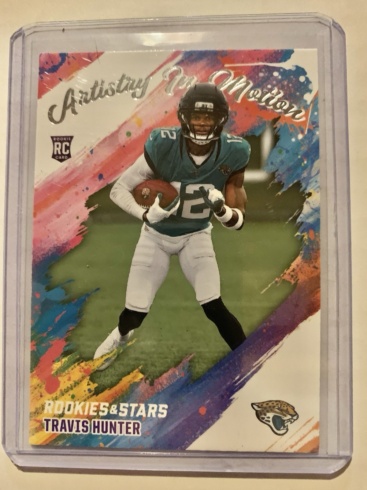 2025 Panini Rookies & Stars - Travis Hunter Artistry In Motion #8 (RC)