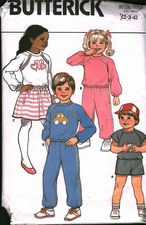 6714 Butterick Vintage SEWING Pattern Girls Loose Fitting Top Shorts Skirt Pants