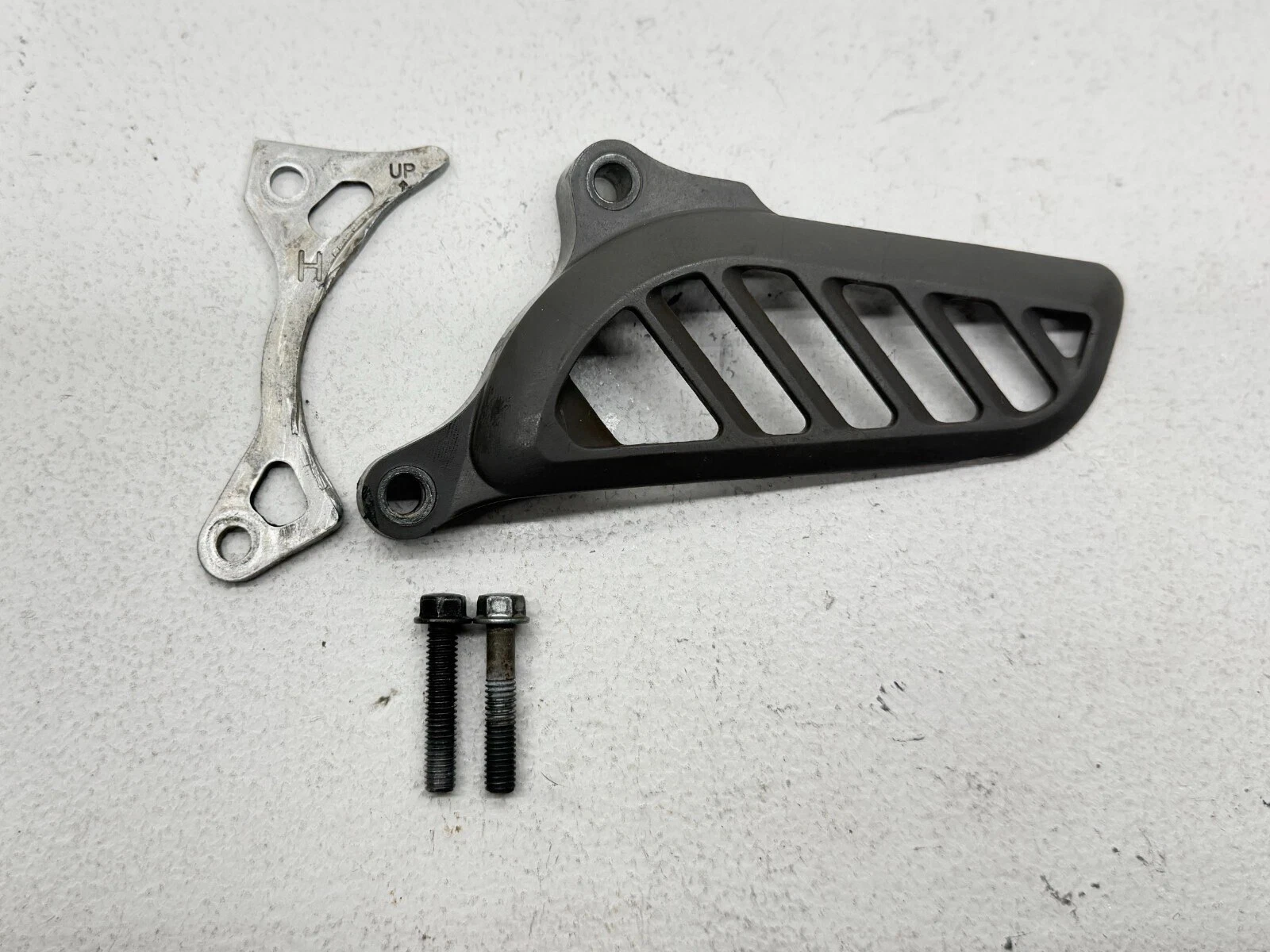 2015 Suzuki RMZ250 Front Sprocket Chain Guard Case OEM Saver Bolts