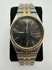 Vintage Seiko 7N43-7A59 Quartz Day Date Black Dial Two Tone Mens Watch Japan