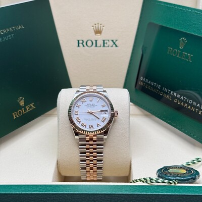 Rolex Datejust 31 NEW 2025 White Roman Dial Two Tone Rose Gold Fluted Jubilee
