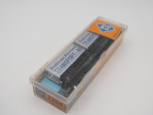 Spur N Roco   2354   /   Flachwagen mit Sattelauflieger Transport AG  -  OVP | Zustand: Gebraucht