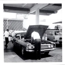 Man Checking Engine at Gas Station Huntington Park California 1960s Found Photo