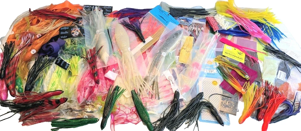 Lote de señuelos de pesca suaves Hoochie: pulpo, calamar, faldas trolling, jigging nuevos de stock Foto 2 de 4