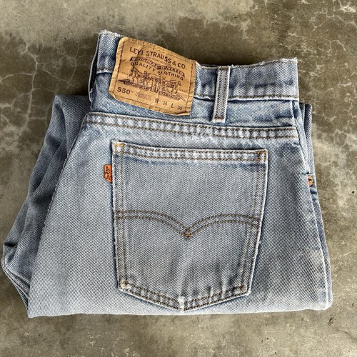 Vintage 90’s Levi’s 550 Orange Tab Denim Jeans Light Wash 33x26