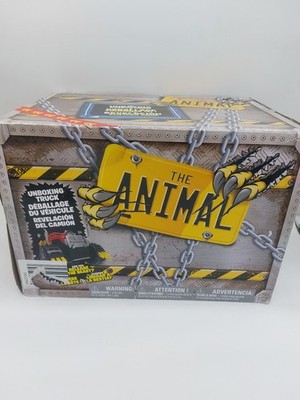 The Animal interaktiver Unboxing Spaß Spinmaster Monster Truck