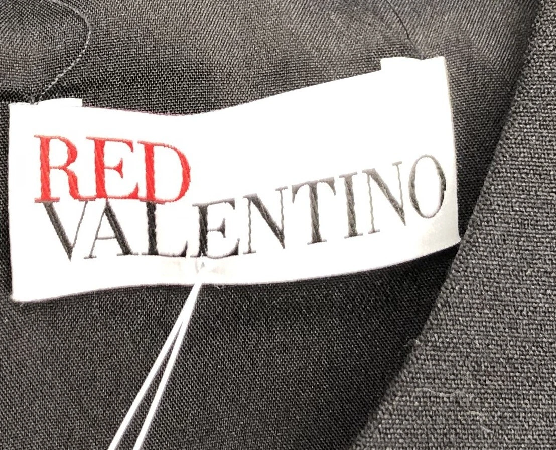 Abito rosso Valentino nero senza maniche con borchie effetto cintura orlo peplum taglia 44