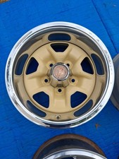 Oldsmobile Cutlass Rally Wheel 14x7 W Trim Ring And Bolt-on Center Cap