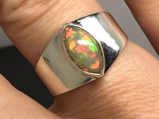 Ethiopian opal ring size Q marquise actual one shown, natural stone Bezel set.