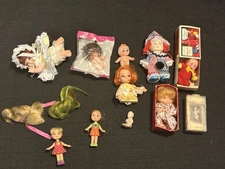 11 random vintage small dolls… Mattel, UD CO AN MORE