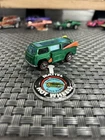 Hot Wheels redline Volkswagen Beach Bomb in green. Very near mint & button