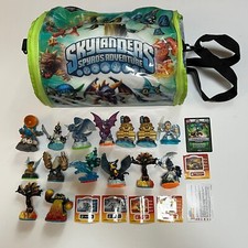 Lot of 15 Skylanders With Carrying Case And Stickers.