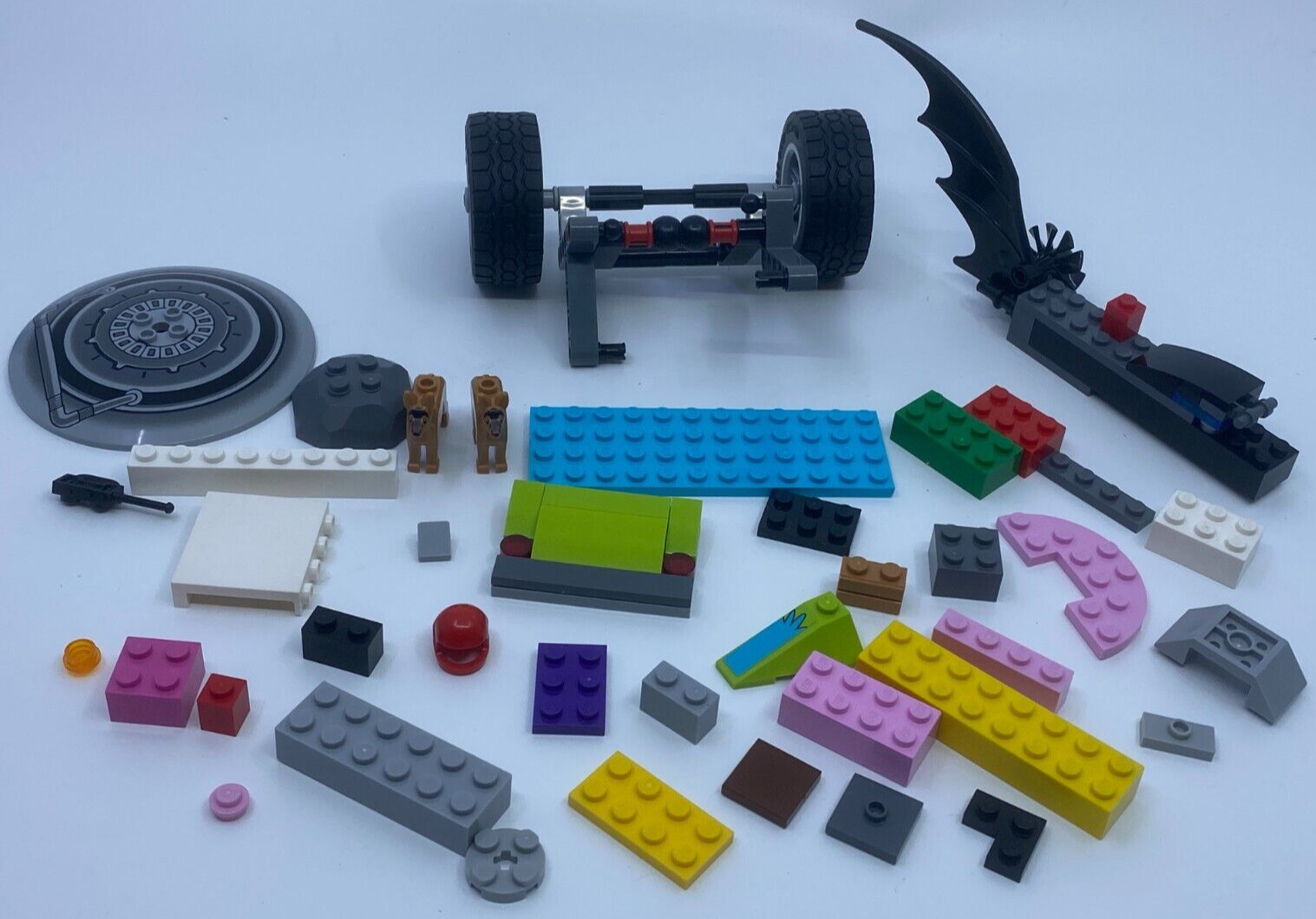 Miscellaneous LEGO Lot 5 ounces Wheels Bat Wing Dogs Shield Bricks etc