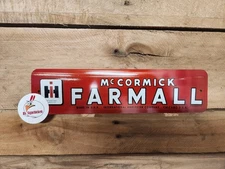 McCormick FARMALL TRACTOR LOGO  portrait printed on Aluminum. Barn art, 3 X 12"