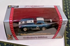 1:43 1965 Shelby Daytona 54 Cobra Blue Die Cast 94243 YatMing Road Signature NEW