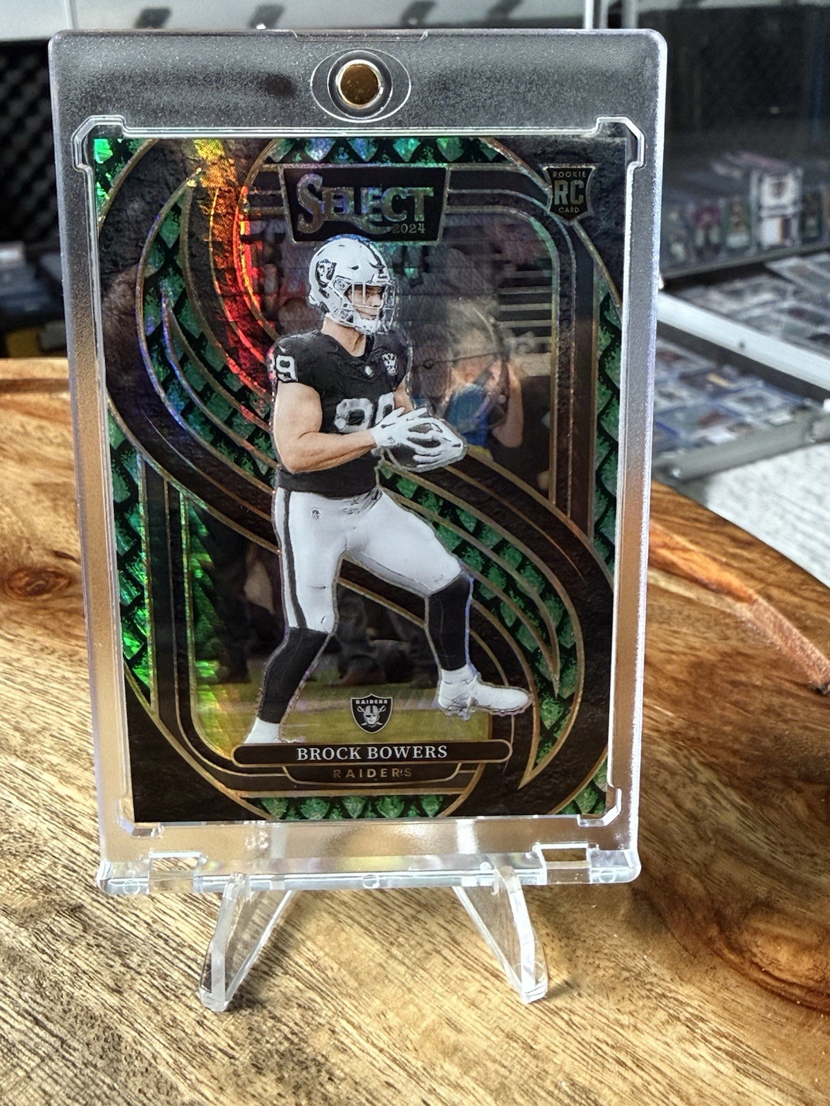 2024 Panini Select - Premier Level Brock Bowers #118 Dragon Scale Prizm /81 (RC)