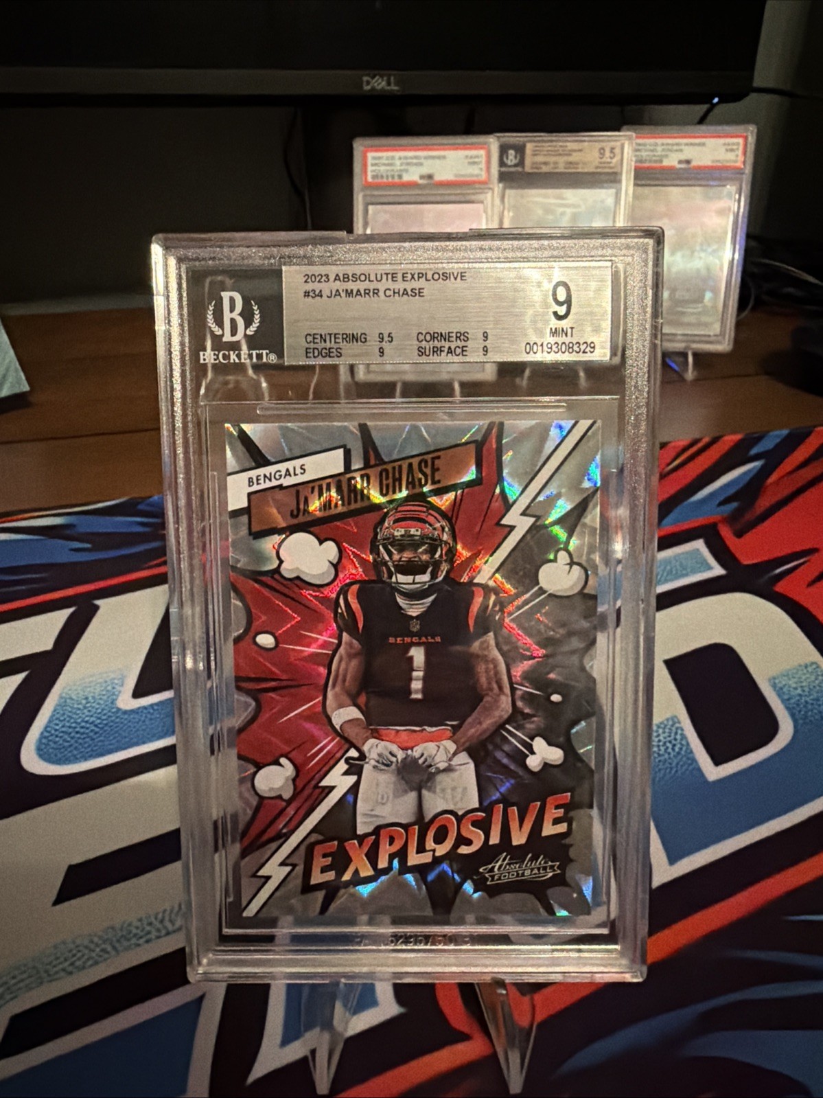 Ja'Marr Chase #34 Football Cards 2023 Panini Absolute Explosive trading card — raw and PSA graded price guide