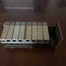 ALLEN BRADLEY SLC-500 10-SLOT RACK 1746-A10. W/ SLC 500 CPU 5/04. W/ MODULES.