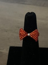 Hand Beaded Bow Ring made with red delica beads size 6