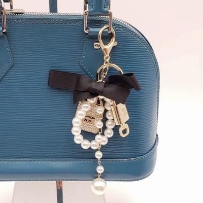 Authentic Louis Vuitton Lock & Key w Unbranded Pearl Purse Charm & Bow Keychain