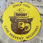 VINTAGE 1953 SMOKEY THE BEAR FOREST FIRE WILDFIRE 12 INCH PORCELAIN ENAMEL SIGN