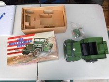 BATTERY OPERATED "THE ADVENTURER JEEP" IN ORIGINAL BOX. WORKS VERY WELL