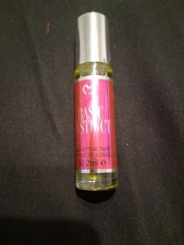 Pure Romance Attractant Oil.