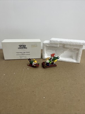 Department 56 Heritage Village Testing The Toys Set Of 2 56057  HAC12