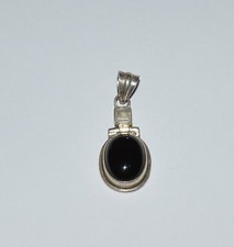 ARTISAN STERLING SILVER BLACK ONYX AND MOON STONE PENDANT