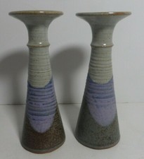 2 southwest style vases candle holders signed Litan?