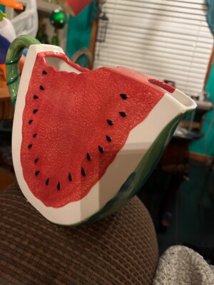 Pitcher  in the shape of watermelon 10 inches high 10 inches wide