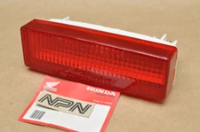 NOS Honda 1986-89 TRX350 TRX350D Fourtrax Rear Tail Light Lens 33710-HA7-671