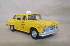 Greenlight 1980 Checker Taxicab Illinois Yellow 1:64 Diecast w/Rubber Tires