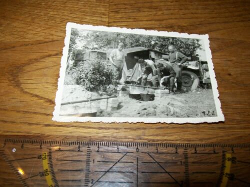 Photo Wehrmacht Landser cooking in position camouflage rest car prey? Food - Picture 1 of 1