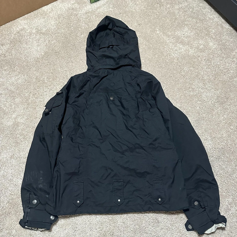 Chaqueta Oakley Para Hombre Pequeña Negra Con Capucha Calce Suelto Cremallera Rompevientos Abrigo Exterior Foto 2 de 4