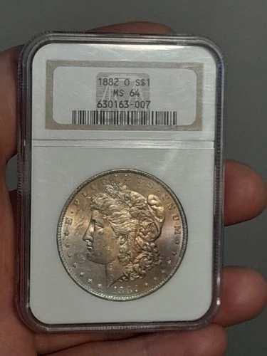 1884- O Morgan Silver Dollar NGC MS64 Toned Obverse