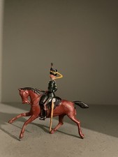 Mounted Lead Toy Soldier. Britains Hussar on cantering horse. 