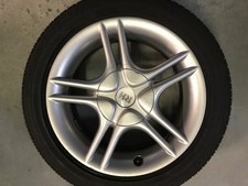 Satz Alufelgen Honda 15 Zoll mit Sommerreifen 7Jx15 LK 4x100