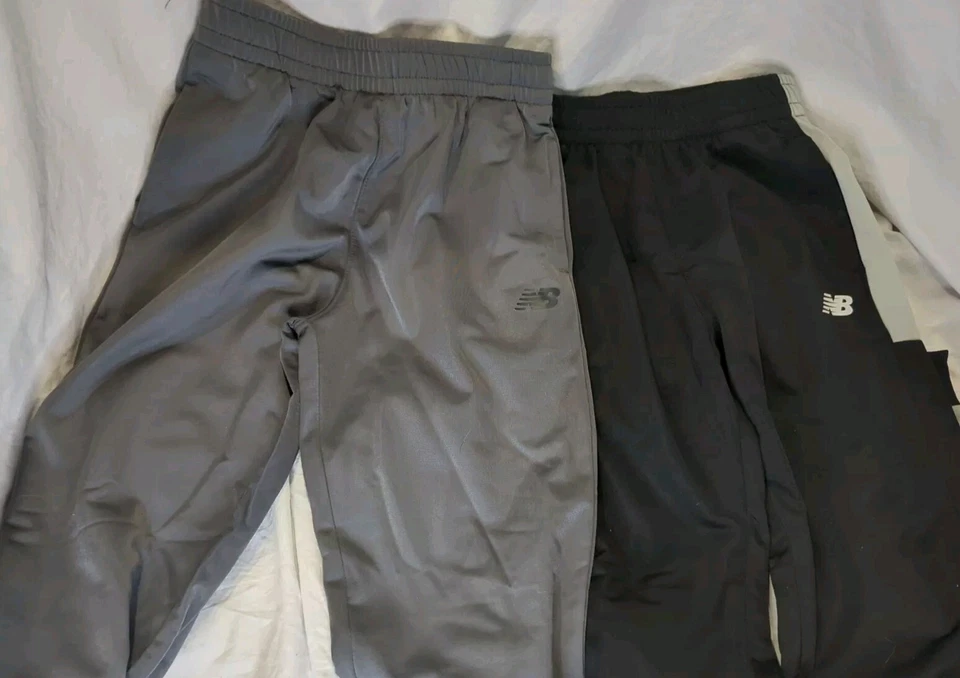 2 Pantalones de chándal New Balance talla 10/12 unisex niños niños niñas negros y grises Foto 4 de 4