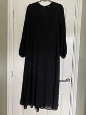 Uniqlo black long-sleeve long dress with detachable slip and pockets size M