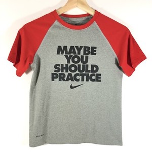 gray and red nike shirt