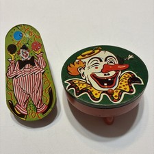 2 Vintage Metal Clown Noisemakers Preowned Made In USA