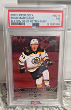 2022-23 Upper Deck Extended Series Brad Marchand Retro-Ruby /100 PSA 7 NHL