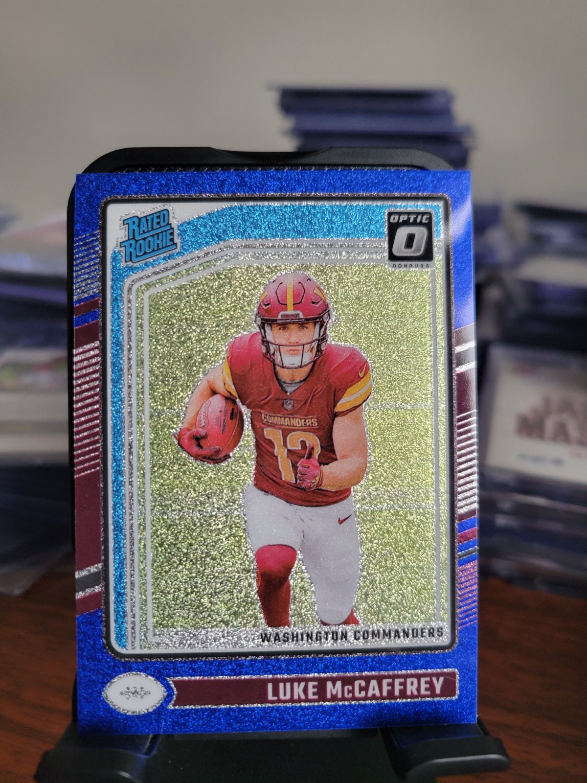 2024 Panini Donruss Optic Rated Rookie Luke McCaffrey #268 Blue Glitter SP