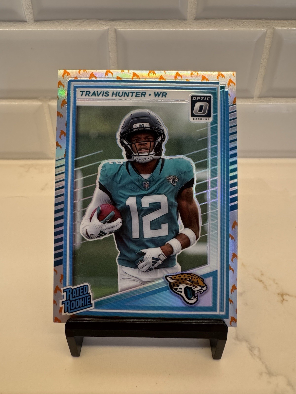 2025 Panini Donruss Rated Rookie Travis Hunter #201 Optic FIRE Emoji SSP (RC)